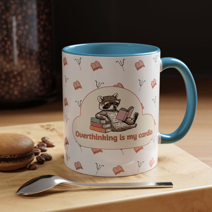 Overthinking Is My Cardio Coffee Mug — Cute Raccoon Reading Accent Mug - You're My Kind of Weird